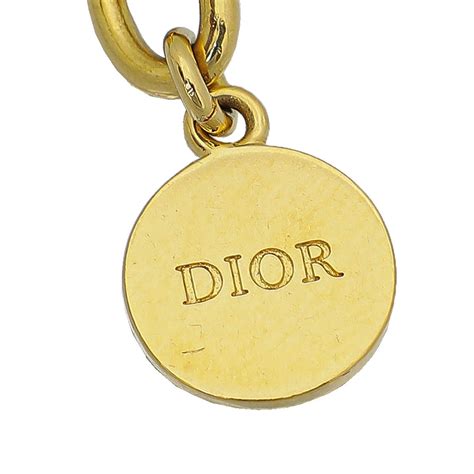 dior wings necklace|Dior gold finish necklace.